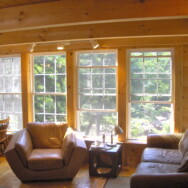 Cherry Dip Cottage Living Room area Leather couches and chairs.